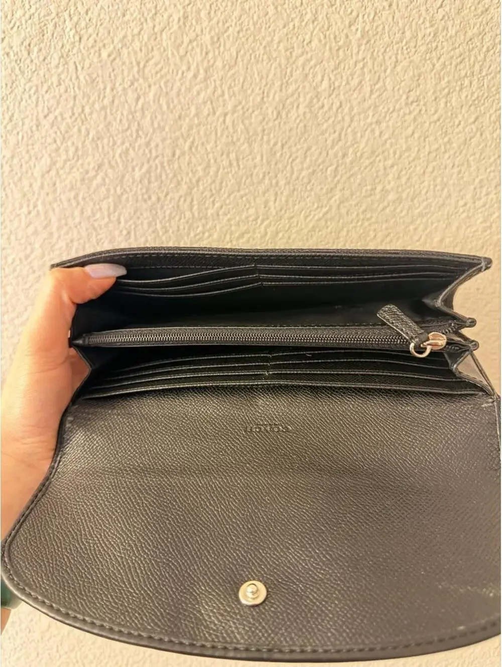 Black Coach Wallet with Silver Emblem